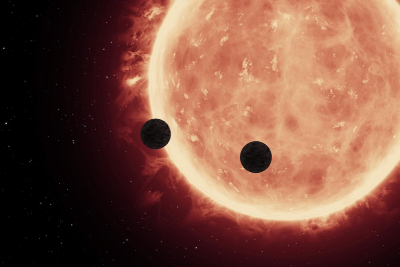 Vue d'artiste du transit de 2 planètes devant l'étoile TRAPPIST-1